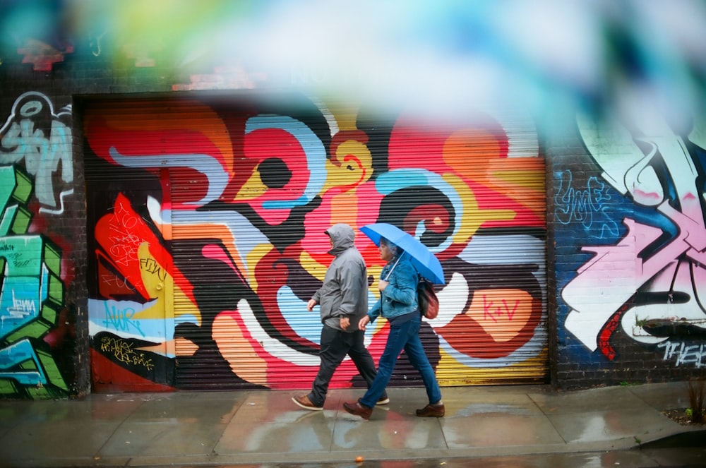 two person walking on street