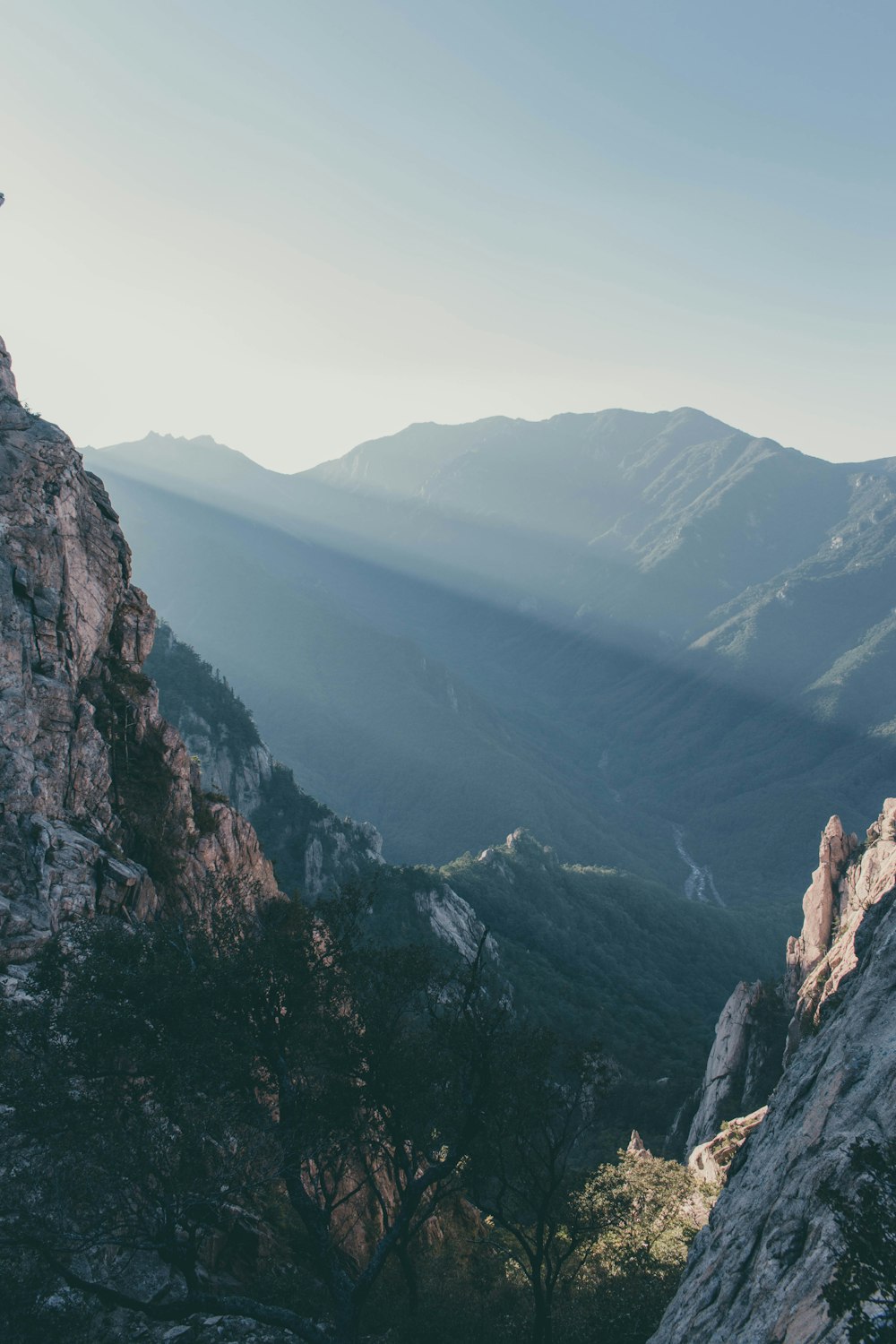 a person standing on top of a mountain