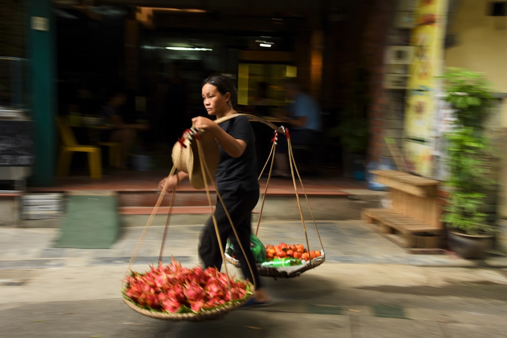 woman carrying stick basket
