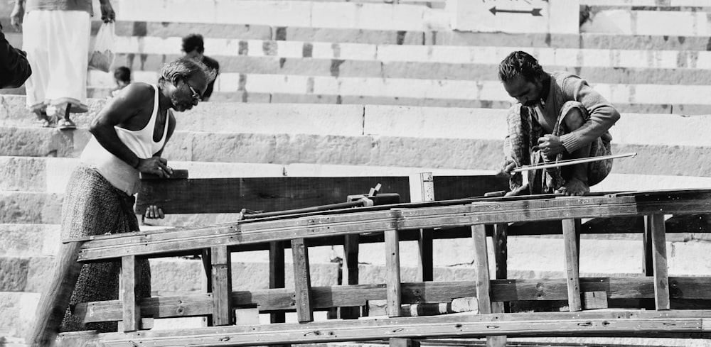 man holding wood