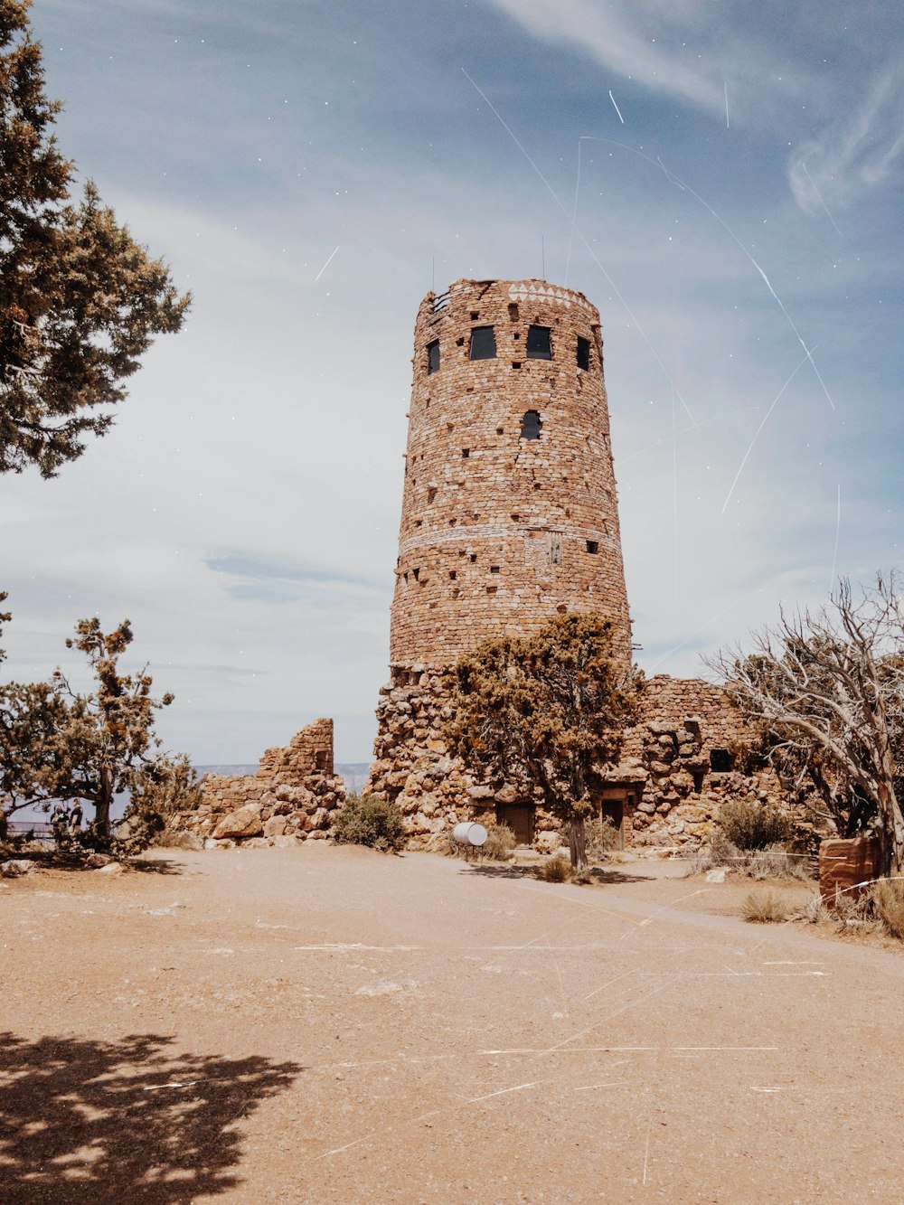 tower by the cliff during daytime