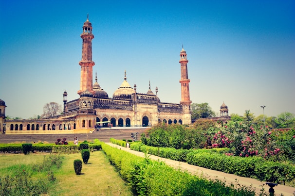 A beautiful historical monument surrounded by lush gardens.