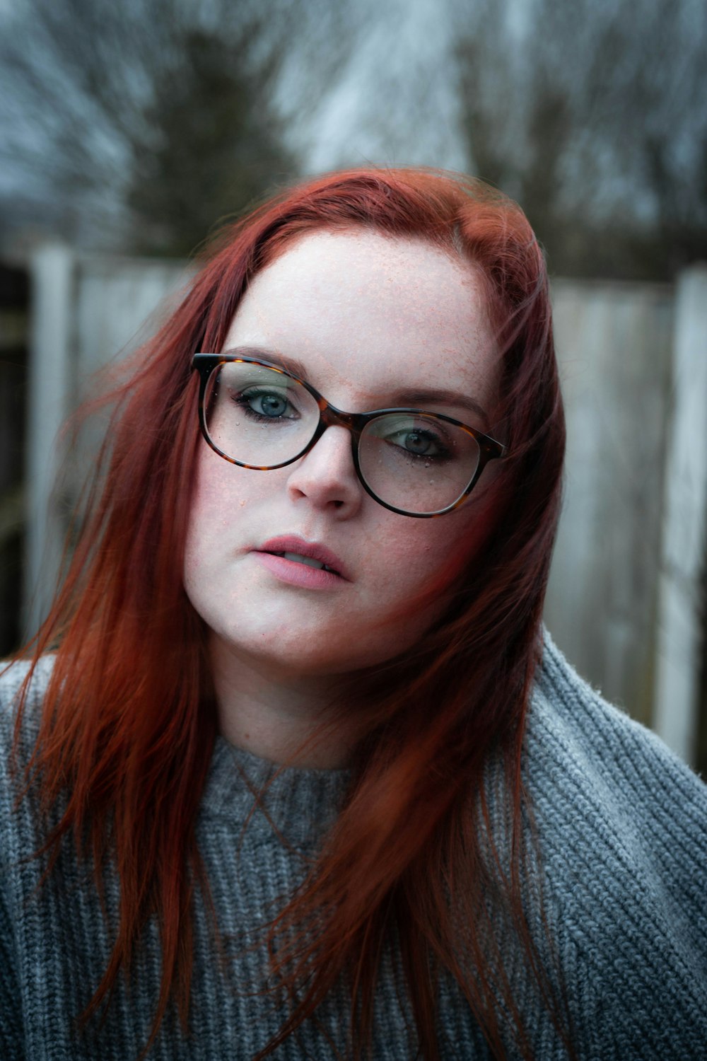 woman wearing black framed eyeglasses