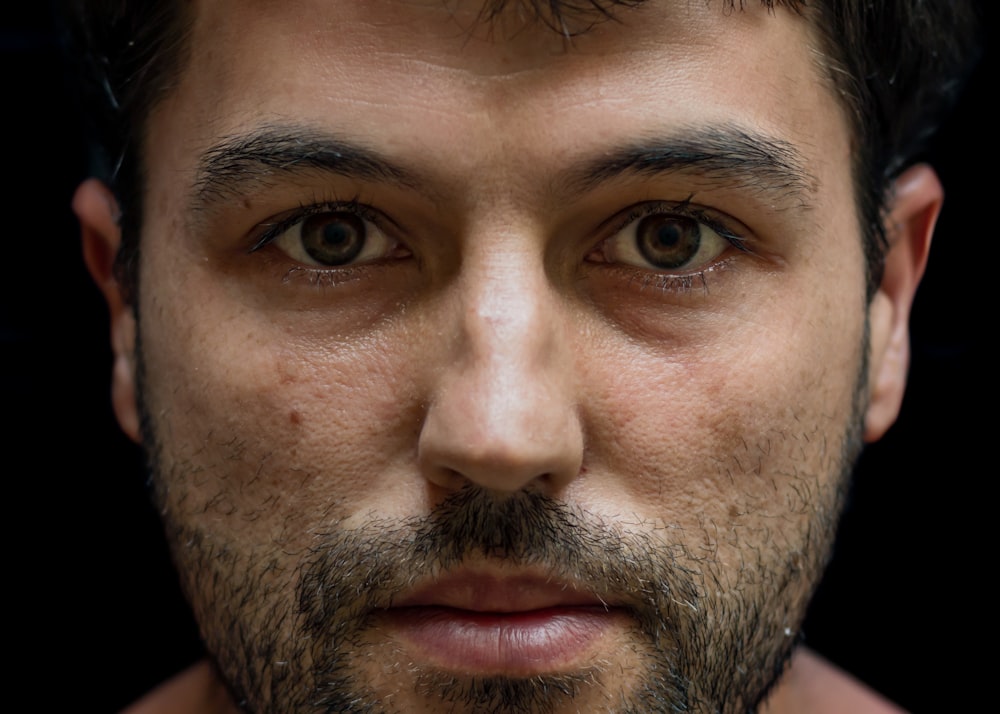 close-up photography of man with beard