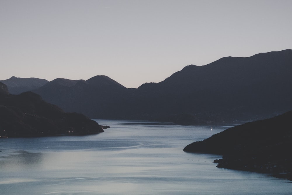 a large body of water surrounded by mountains