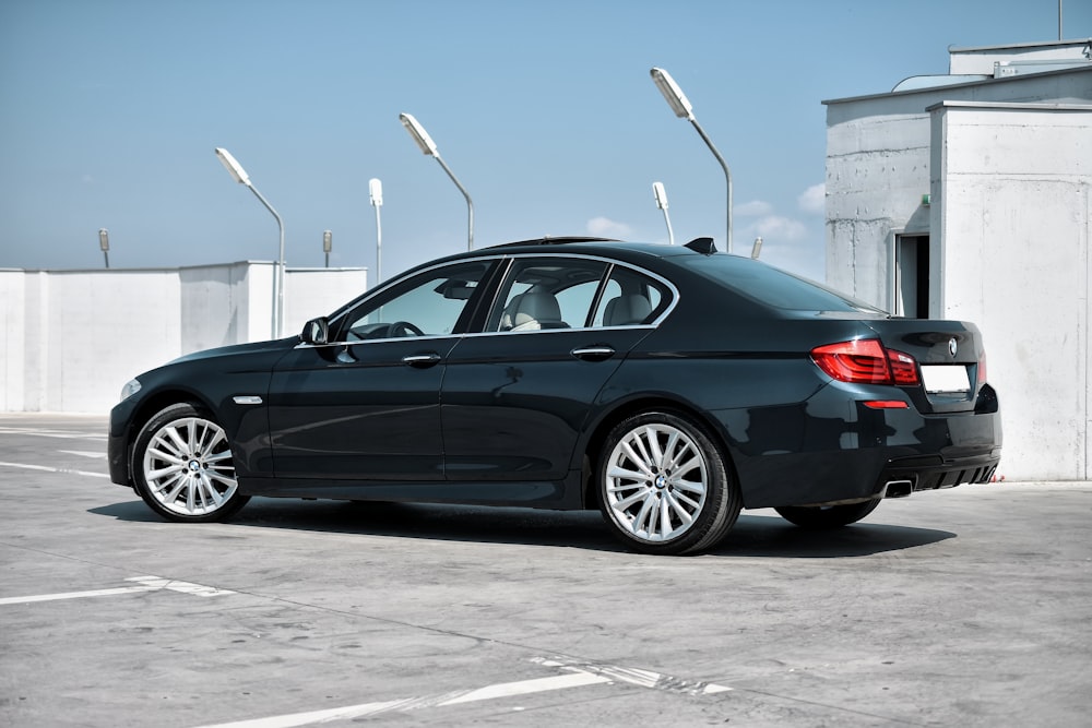 black sedan on parking lot