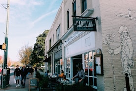 A vibrant retail storefront on a busy Carolina street.