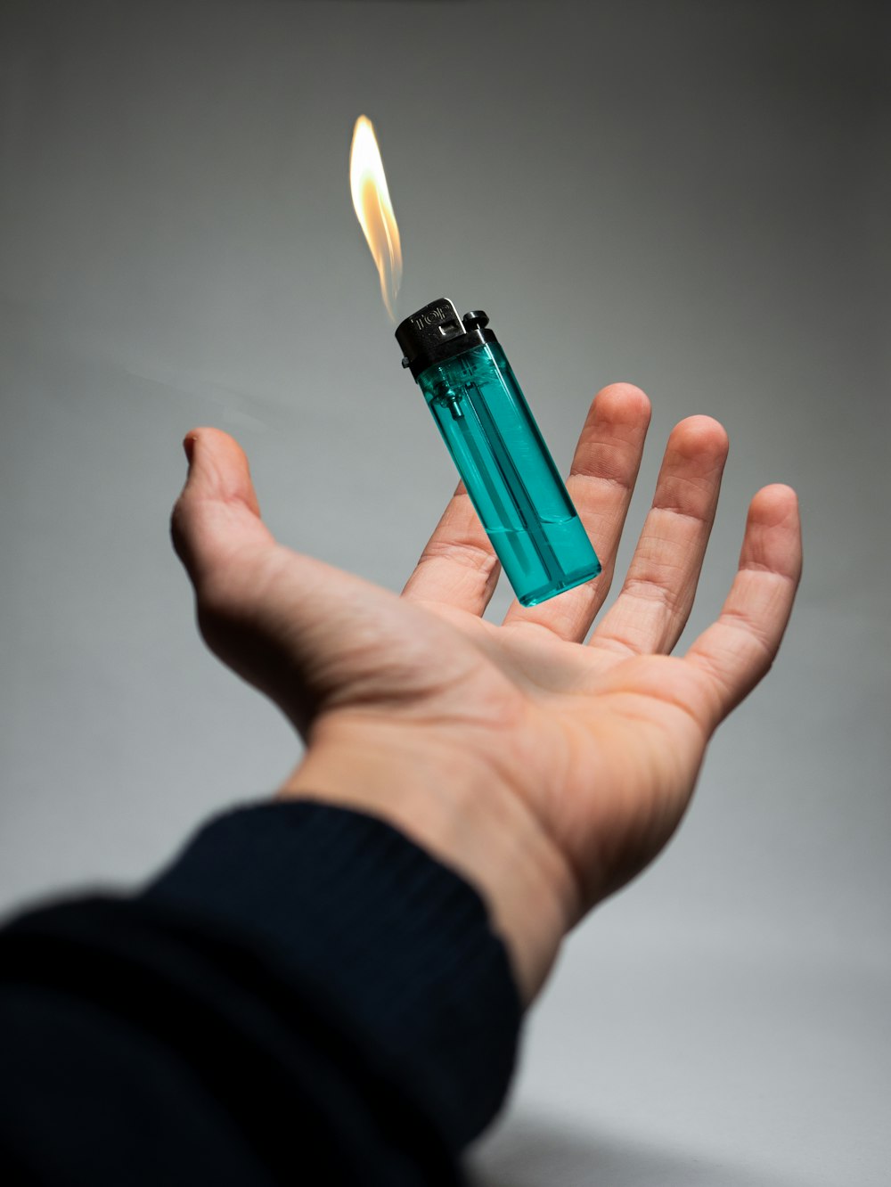 lighted blue disposable lighter