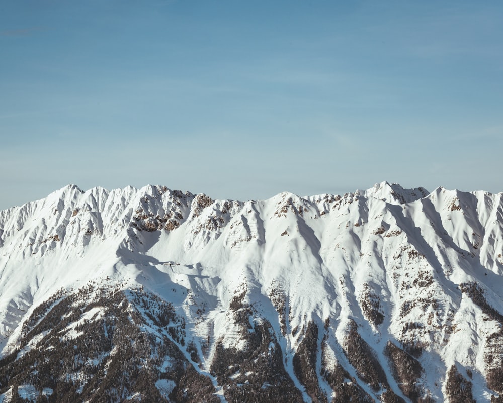 mountain covered by snow