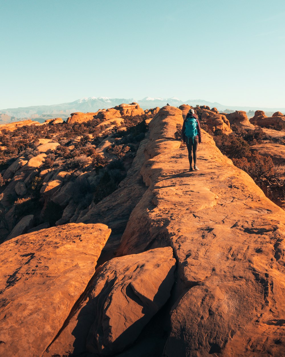 person standing on stone during daytime