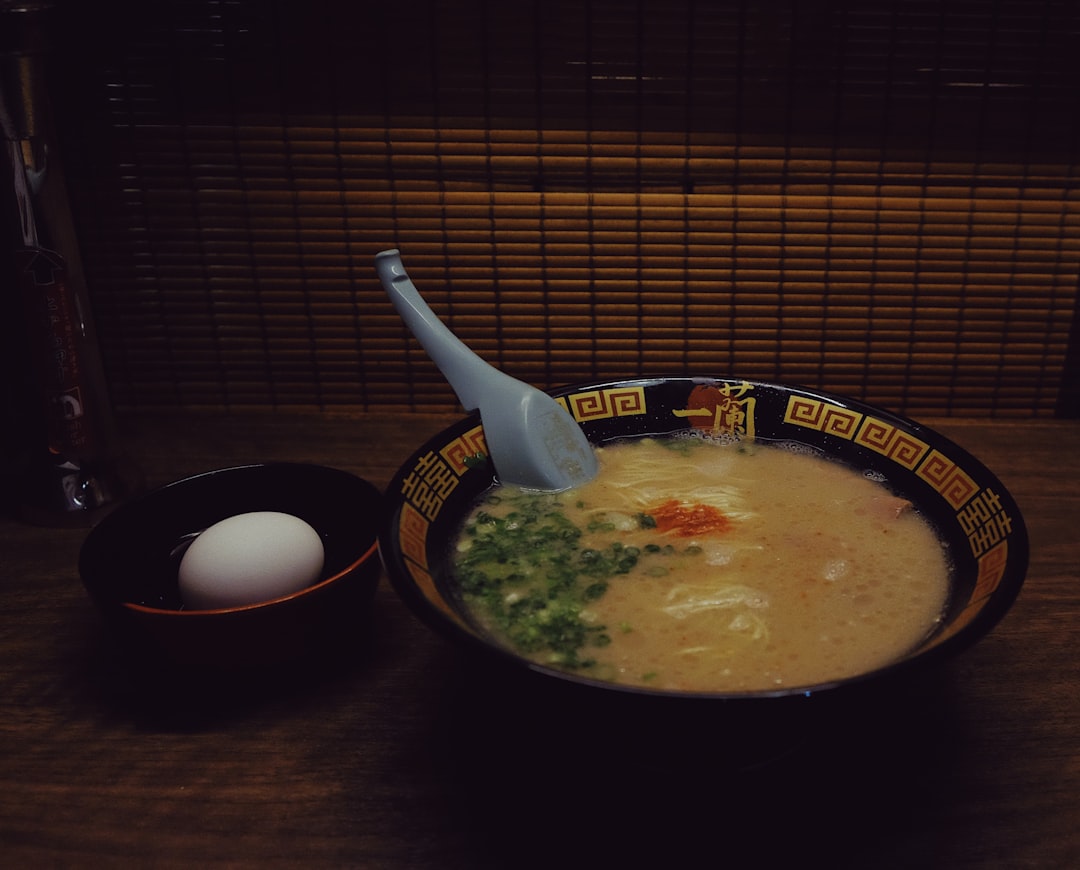 soup in black ceramic bowl