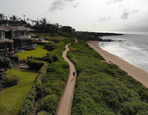 Serene coastal pathway near premium homes along Portugal’s coastline