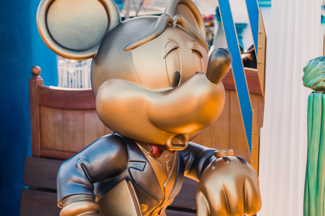 Mickey Mouse near bed,