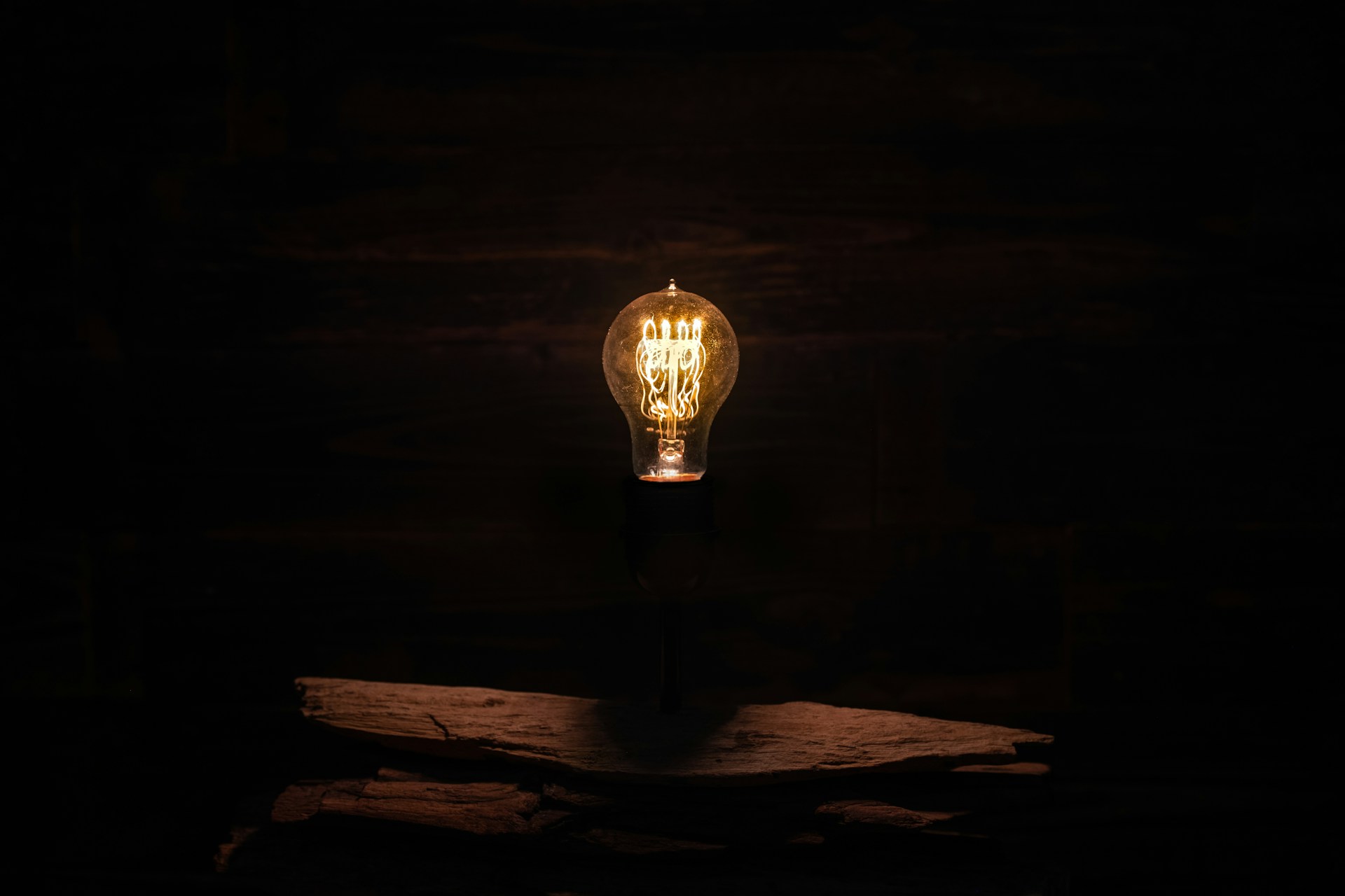lighted incandescent lamp on wall