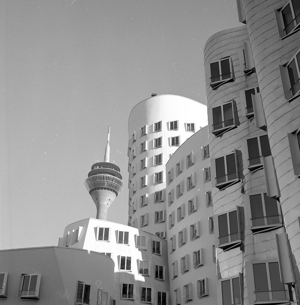 grayscale photo of high-rise buildings