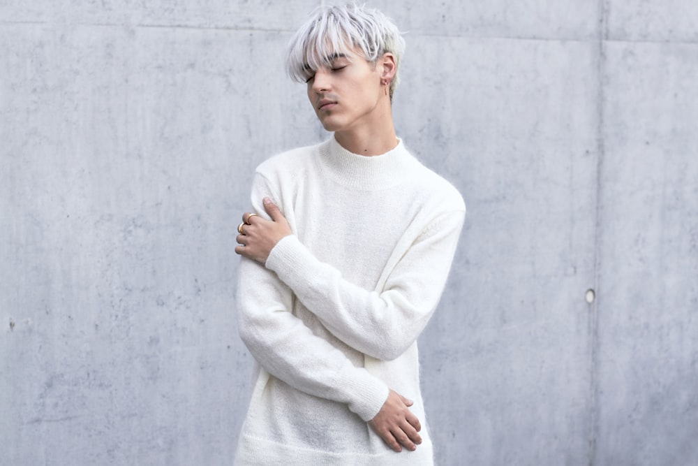 man wearing white long-sleeved shirt