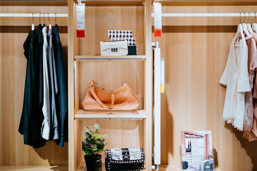 brown leather bag in shelf