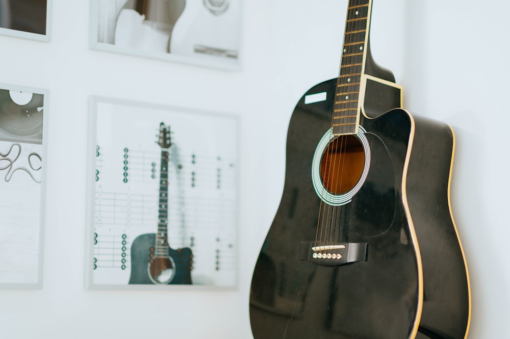 black and brown acoustic guitar