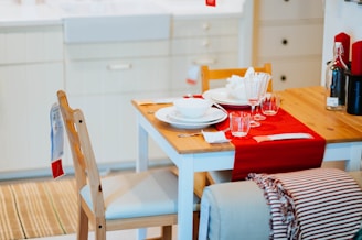 rectangular brown and white wooden table with chairs