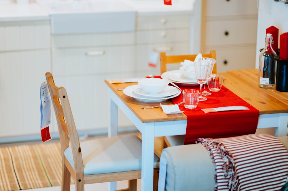 rectangular brown and white wooden table with chairs