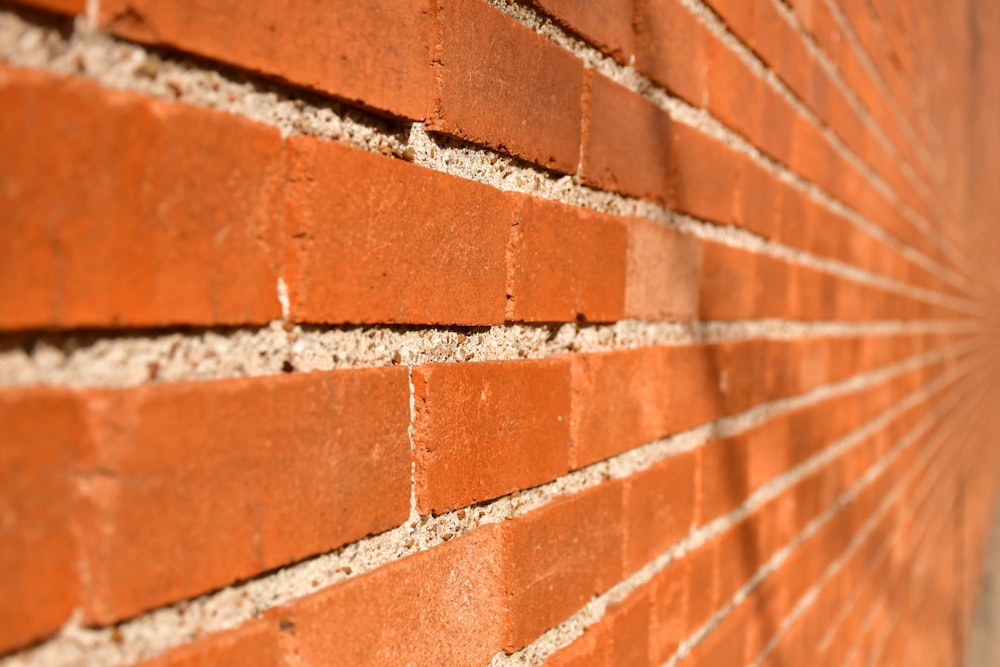 a close up of a brick wall made of bricks