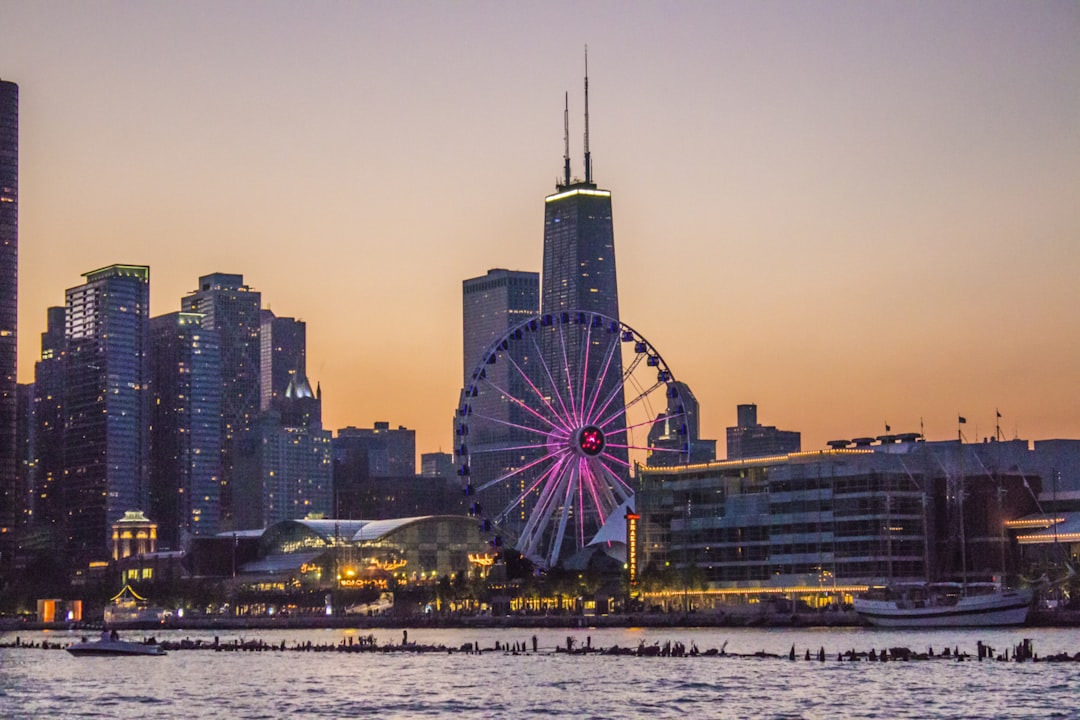 Ferris wheel, The Chicago skyline as seen from the Adler Planetarium at dusk.