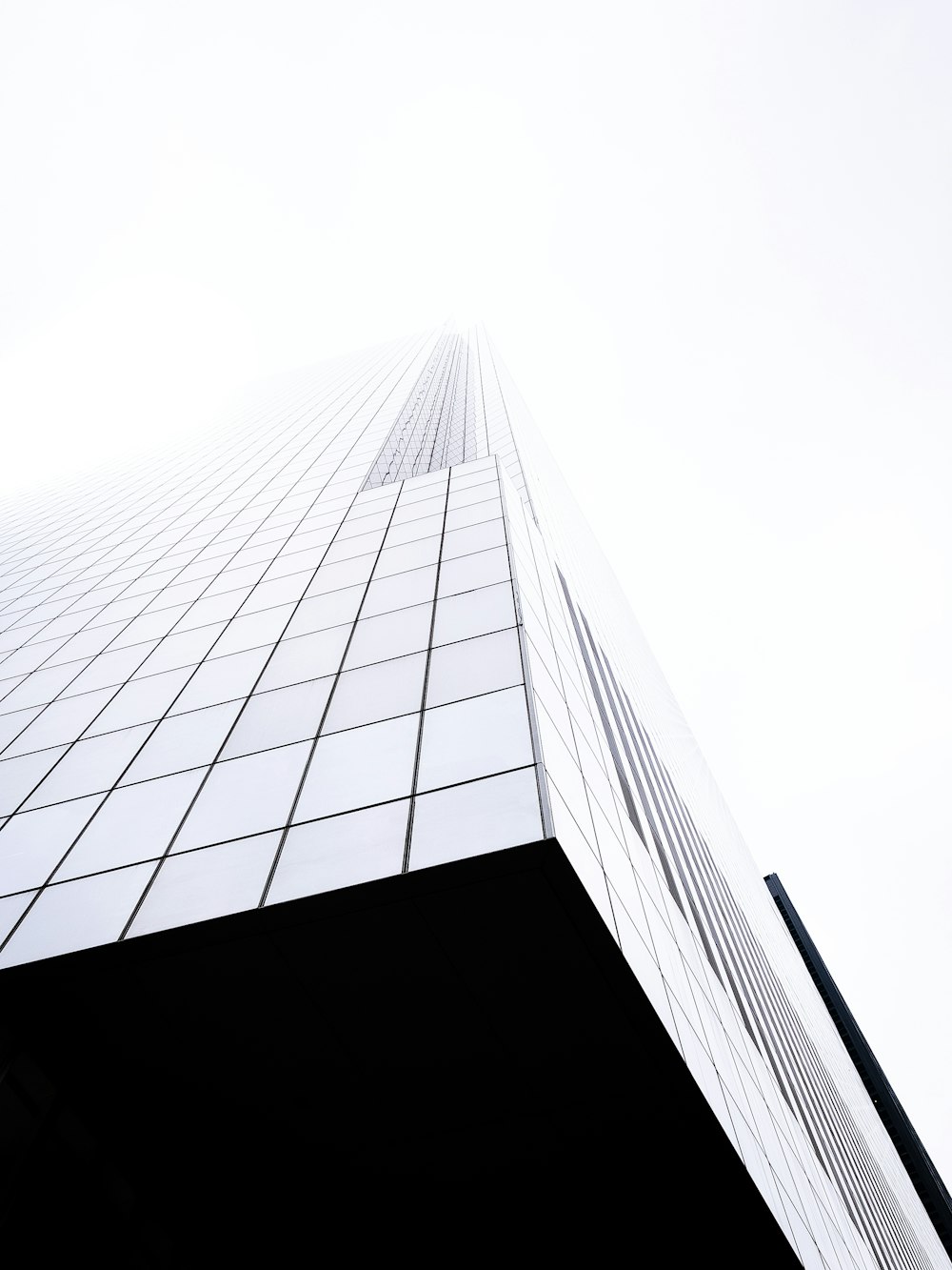 low-angle photography of high rise building