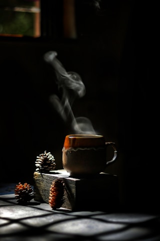 brown ceramic mug