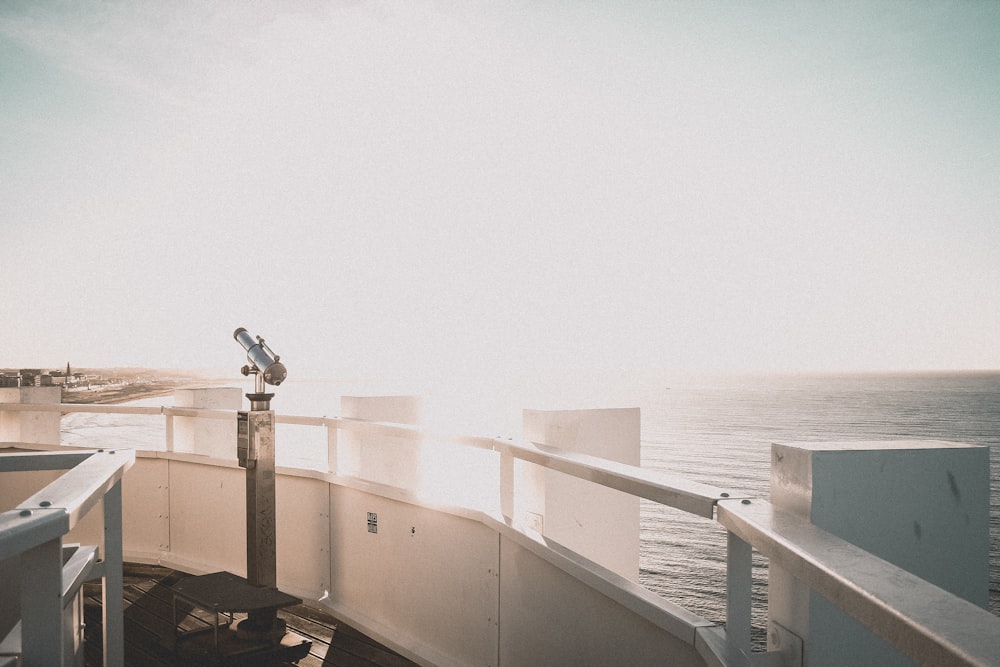 telescope overlooking sea