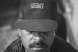 man wearing security cap