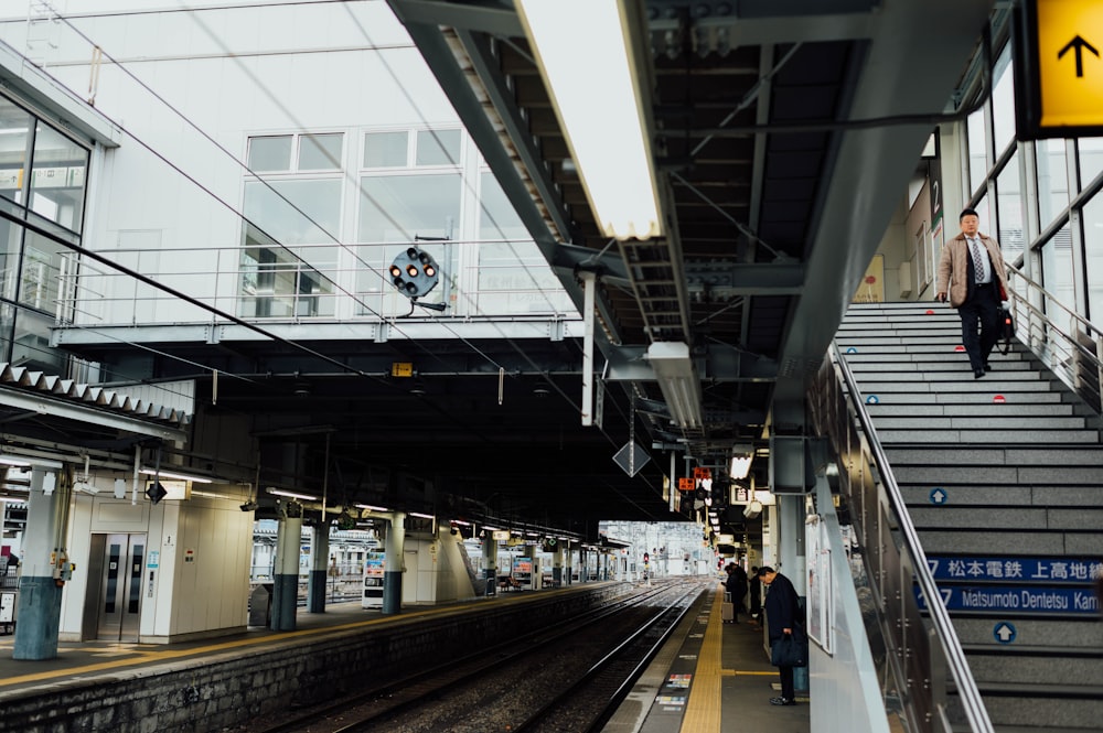 people in train station