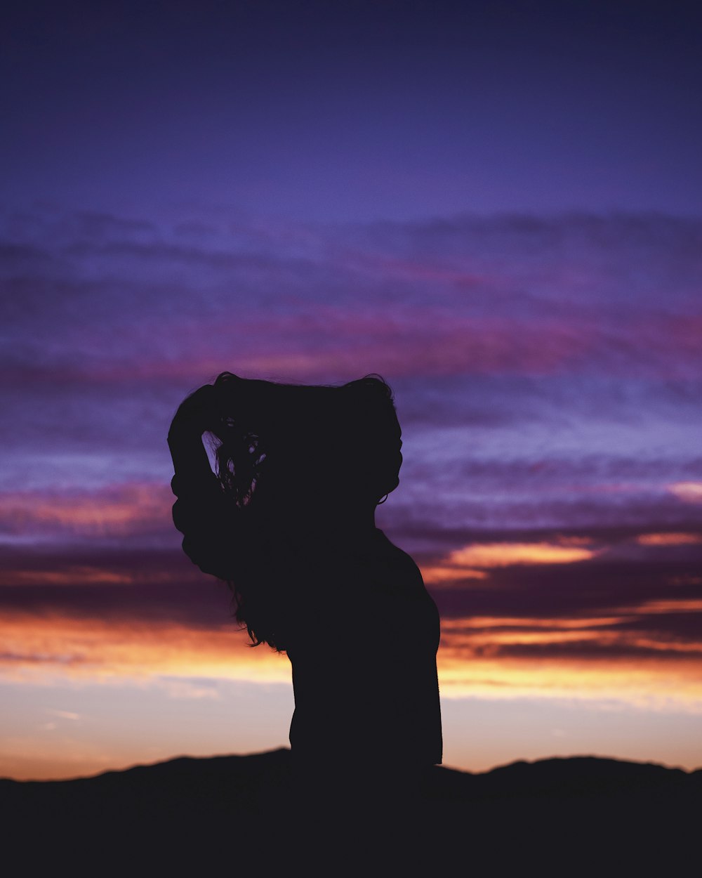 silhouette photograph of woman