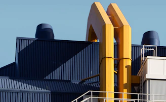 yellow and black factory during daytime