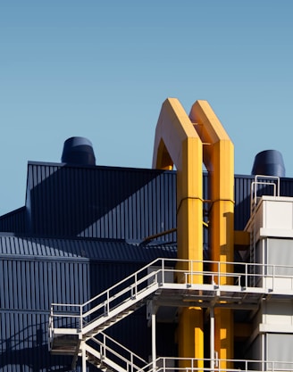 yellow and black factory during daytime