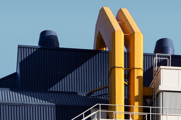 yellow and black factory during daytime