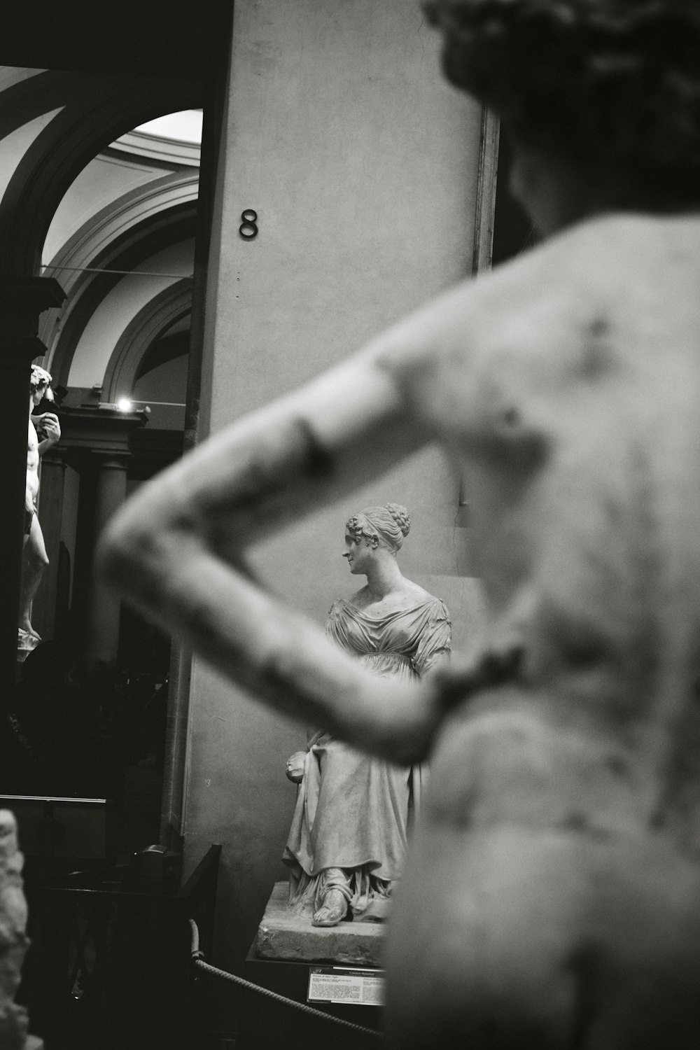 grayscale photography of statues