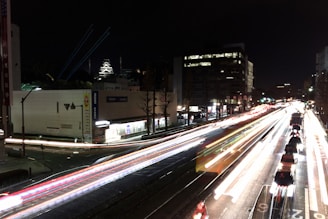 An artistic shot of a bustling city street at night.