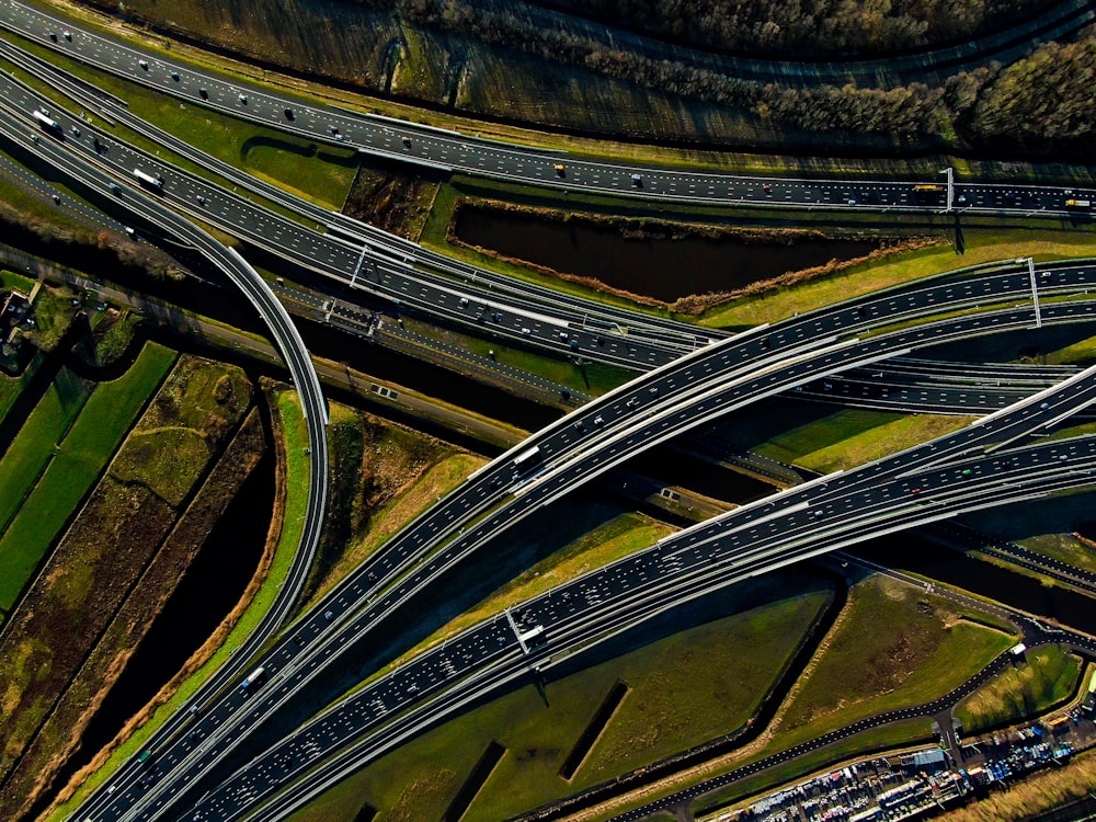 aerial view of vehicles crossing on roads