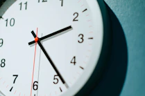 analog wall clock displaying 02:24