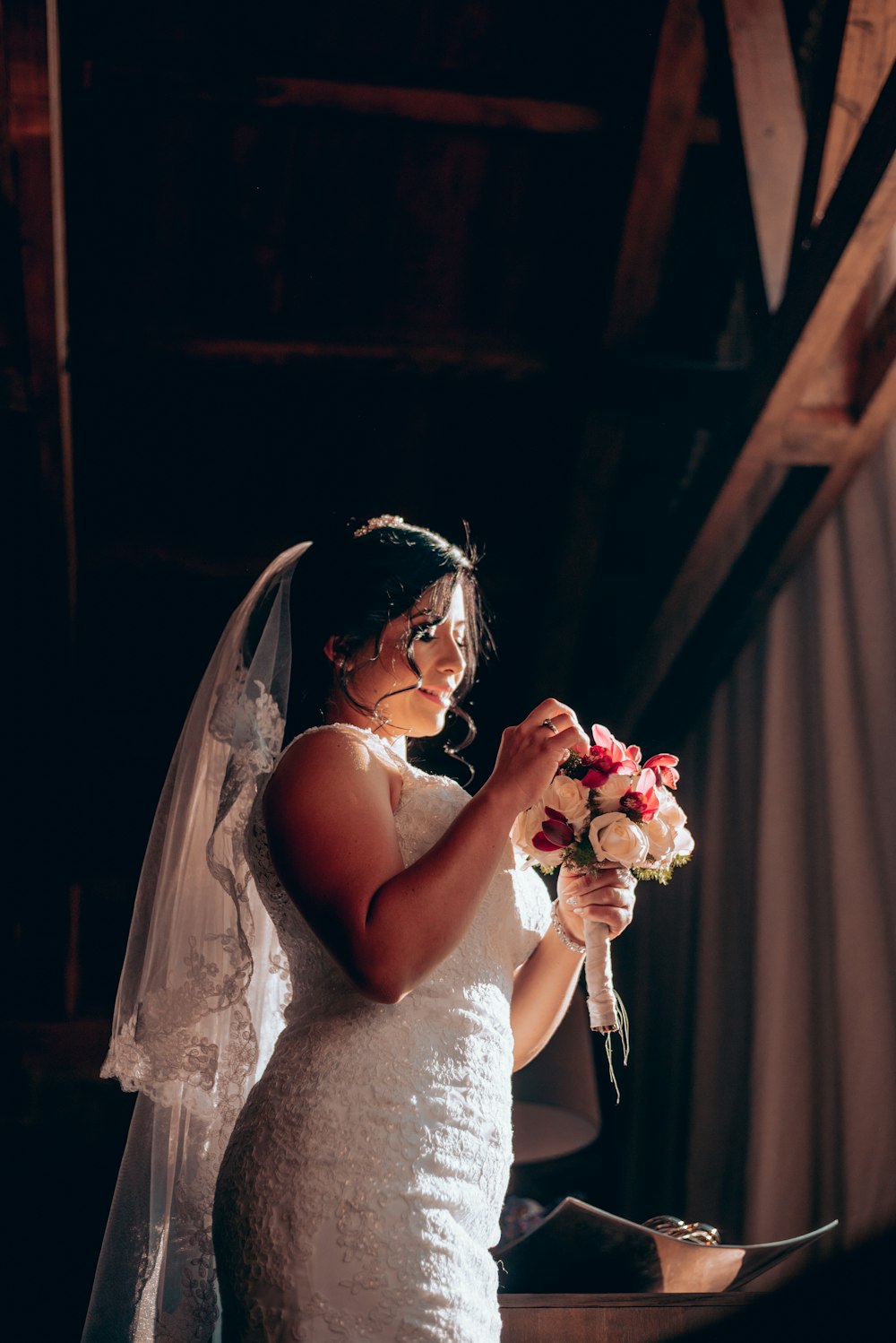woman holding bouquet of flower