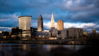high rise buildings near body of water during daytime