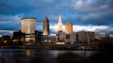 high rise buildings near body of water during daytime