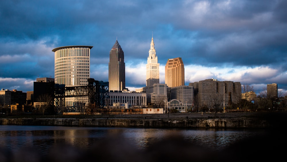 high rise buildings near body of water during daytime