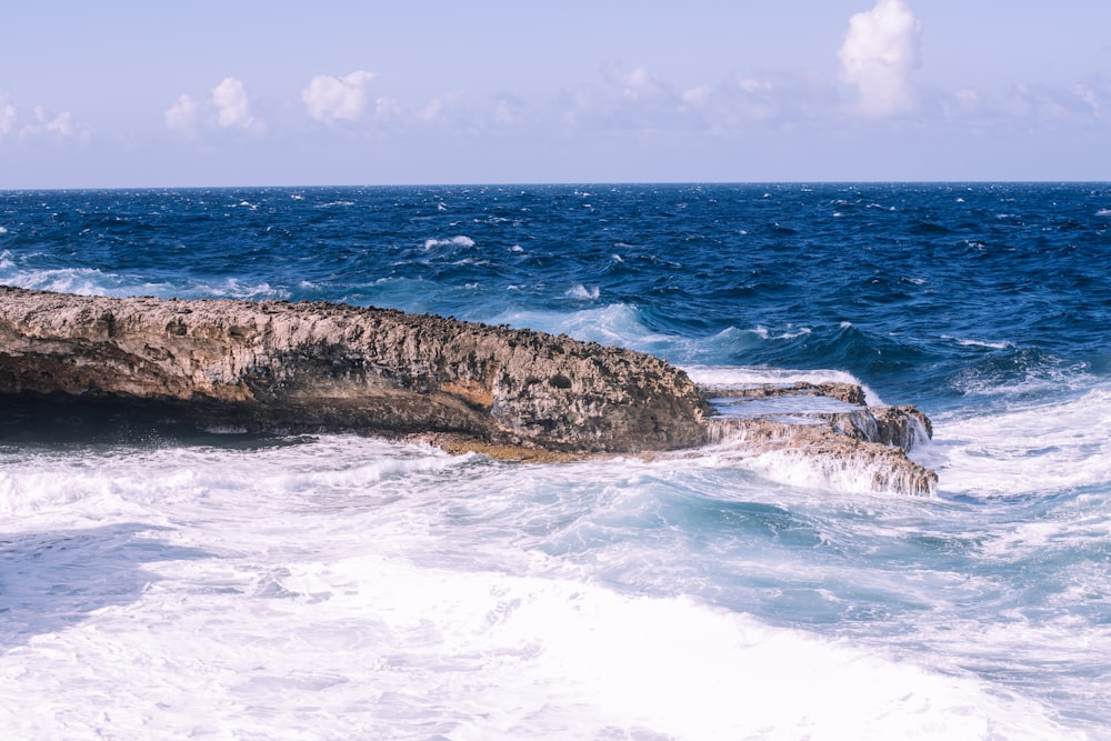 stone formation on body of water