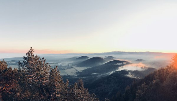 The volcanoes at sunrise above the mist — Clermont-Ferrand, France