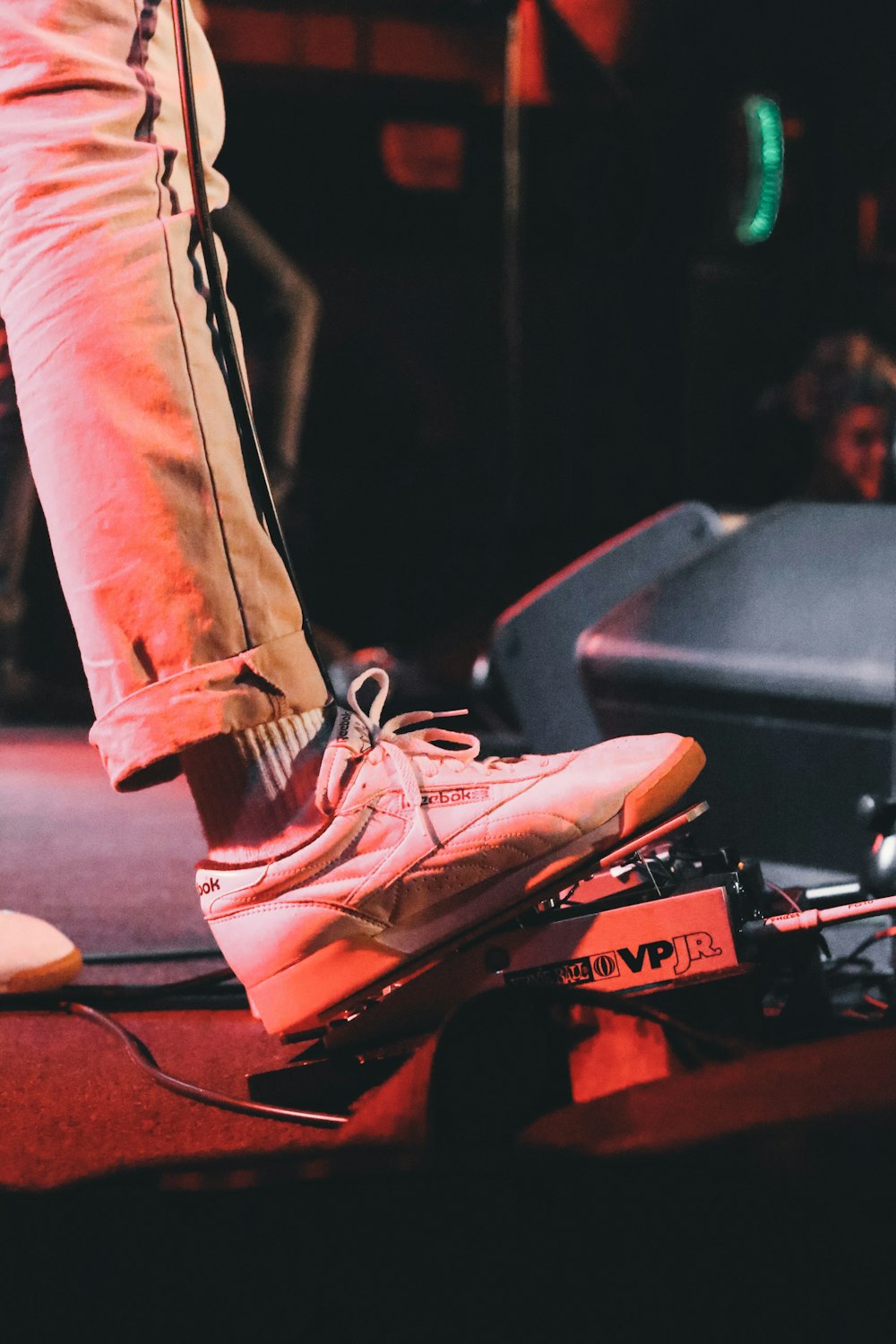 person wearing white pants and white sneaker