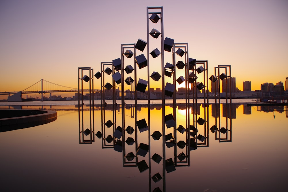 brown metal landmark during golden hour