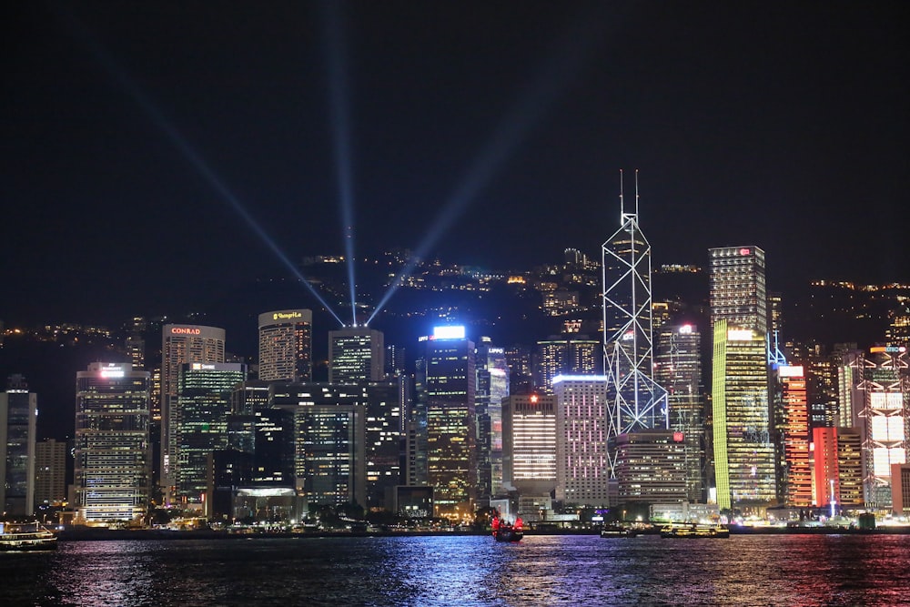 lighted city buildings at night