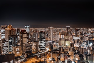 aerial photo of high rise building during night time