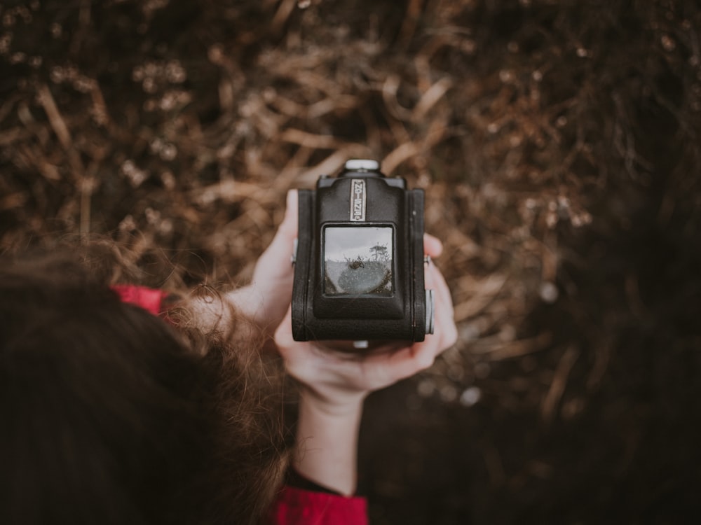 person holding camera